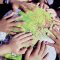 Close-up of children's hands on an inflatable globe