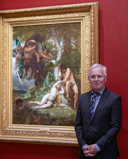 Prof. Thomas Römer in front of the painting "Paradise Lost" by Alexandre Cabanel